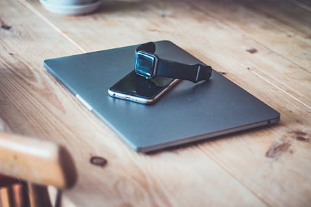 Apple watch on phone on laptop thumbnail