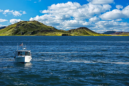 white boat on sea during daytime thumbnail