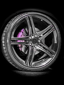 black 5-spoke vehicle wheel and tire thumbnail