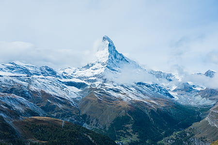 snowcap mountain under blue sky at daytime thumbnail