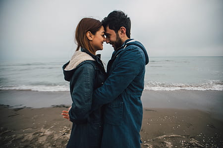 woman and man kissing each other photo thumbnail