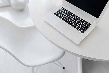 Workplace with laptop on table at home thumbnail