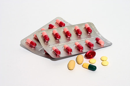 two red medication pills blister pad thumbnail