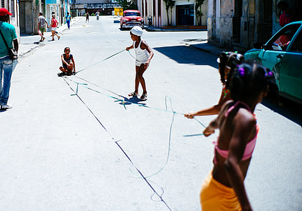 toddler's playing on street at daytime thumbnail