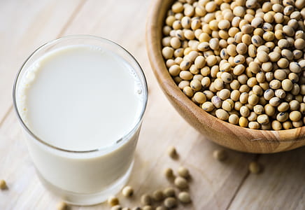 a glass of milk and brown beans thumbnail