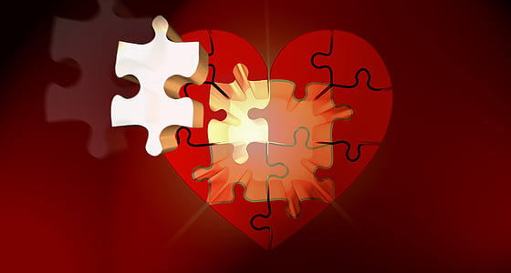 heart red and white puzzle on red surface thumbnail