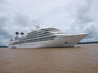 white ship on body of water thumbnail