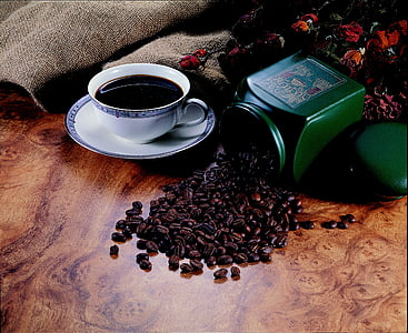 filled-black liquid in coffee cup with coffee beans thumbnail