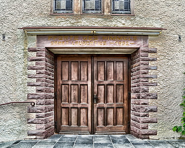 closed brown wooden door thumbnail