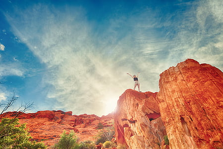 person standing on edge of valley thumbnail