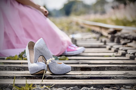 pair of gray platform stilettos on top of gray wooden plank thumbnail