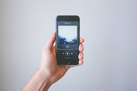 person holding space gray iPhone 6 thumbnail