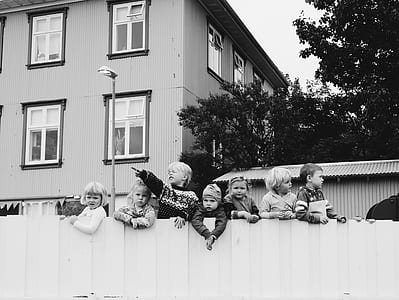 group of kids on wooden fence thumbnail