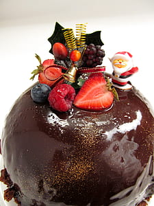 round chocolate coated cake with berry topping thumbnail