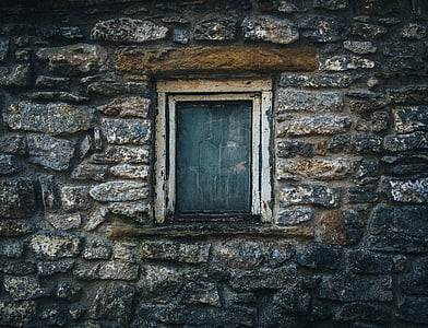 closed window on stone wall thumbnail