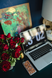 Office Desk Table With Red Roses thumbnail