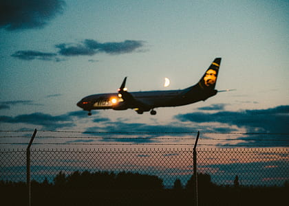 silhouette low-angle photo of airliner thumbnail