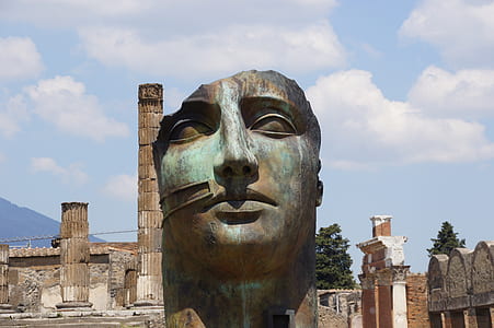 grey and blue statue head thumbnail