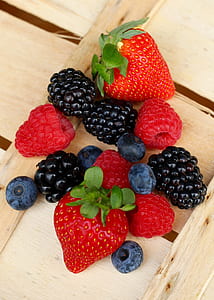 closeup photo of strawberries, raspberries , and blueberries thumbnail