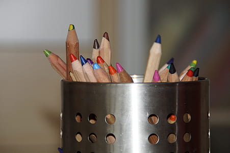assorted-color pencils in can thumbnail