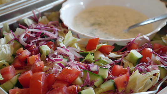sliced vegetable salad near white ceramic bolw thumbnail