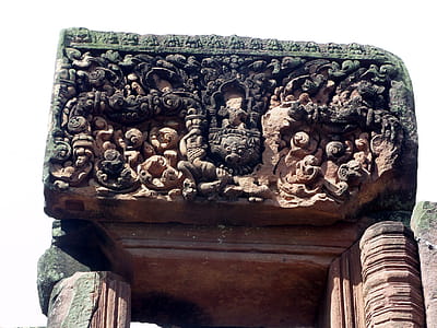 Ancient Hindu carvings in 700 year old in temple ruins dedicated to the god Shiva and located in Roi-et Thailand thumbnail