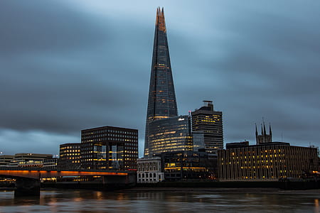 photo of high rise buildings during night time thumbnail