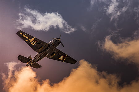 low angle photography of aircraft thumbnail