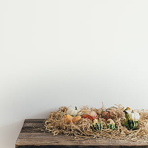 white pumpkin on brown wooden table thumbnail