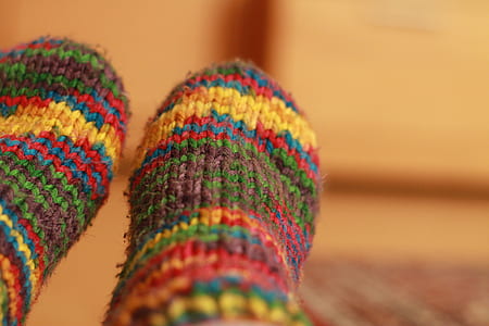 selective focus photography of pair of multicolored foot socks thumbnail