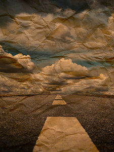 close-up photography of clear road under white clouds during daytime thumbnail