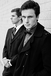 grayscale photo of two men in suit jackets thumbnail