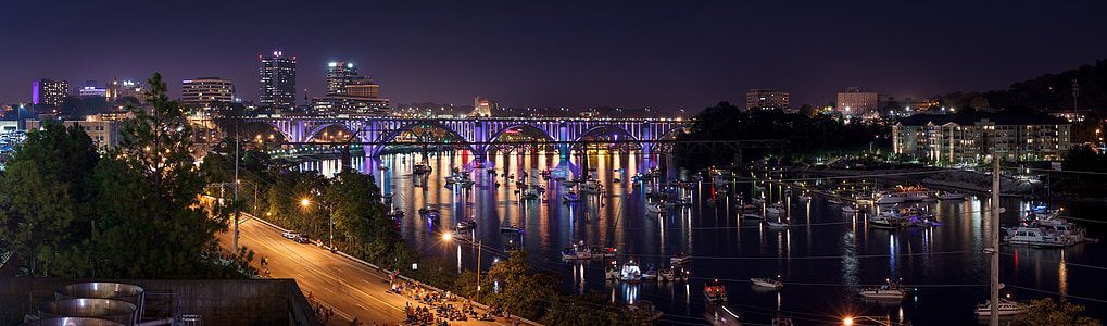 panoramic photography of bridge during night time thumbnail