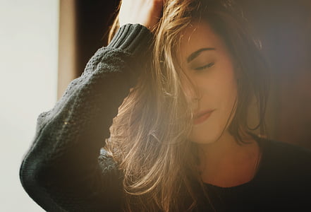 woman in black sweater thumbnail