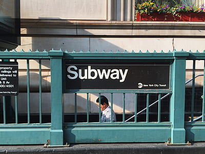 man walking towards the subway thumbnail