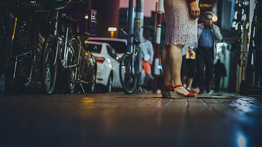 person standing near bicycle thumbnail