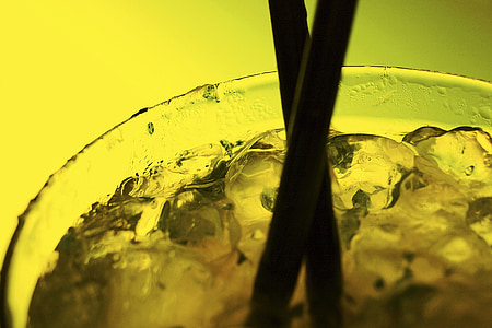close-up photo of two black straw in glass cup with ice thumbnail
