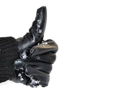 person wearing black leather glove with thumbs up hand sign thumbnail