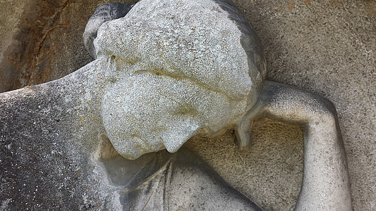 photo of person embossed statue thumbnail