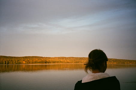 Woman Facing Body of Water thumbnail