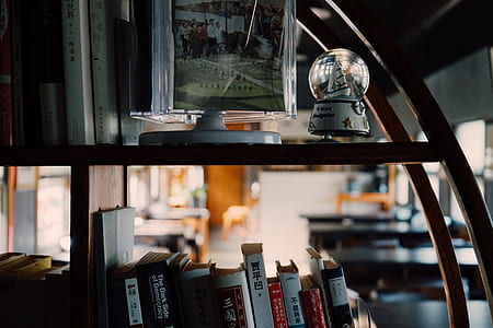 books on rock with snowglobe thumbnail