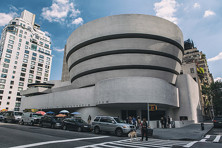Wide angle street shot of the exterior of the Guggenheim Museum in Manhattan, New York City thumbnail