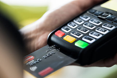 Retail Store Business Owner using Credit Card Terminal thumbnail