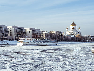 Boat on Water Beside City thumbnail
