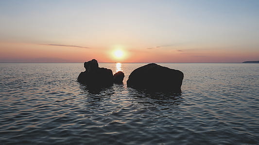 rock formation in body of water thumbnail