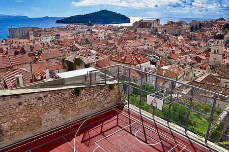 high angle phoography of ed basketball court during daytime thumbnail