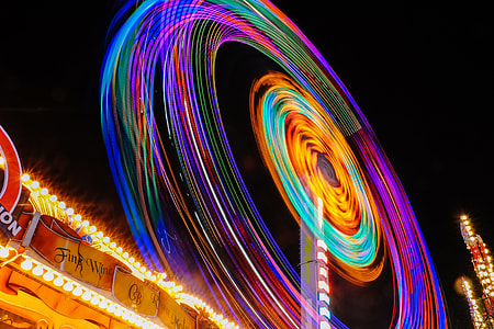 time lapse photography of ferris wheel during night time thumbnail