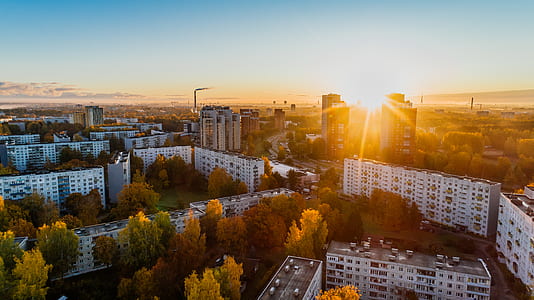 Aerial View of White Concrete Buildings during Golden Hours thumbnail