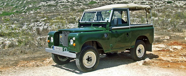 photo of green and black car during daytime thumbnail