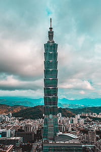 blue and gray concrete building during day time thumbnail